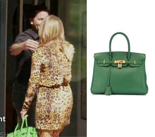 Khloe Kardashian shields her 'bump' with green Birkin bag