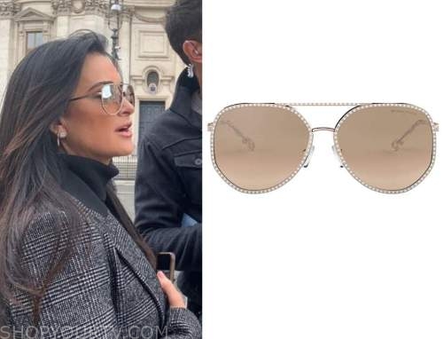 Kyle Richards wearing Chanel lambskin aviator sunglasses and matching  backpack while lunching at Il Pastaio restaurant in Beverly Hills  Featuring: Kyle Richards Where: Los Angeles, California, United States  When: 27 Oct 2014