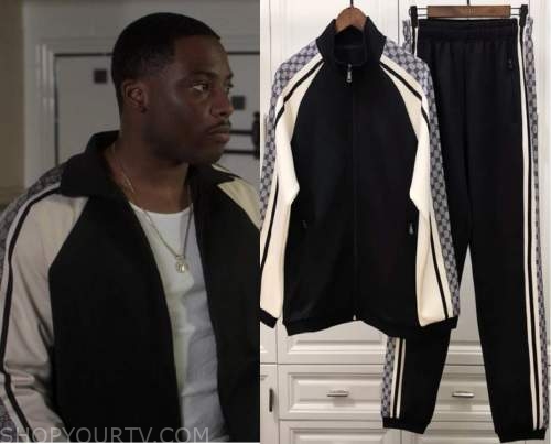 Fendi black bomber jacket with collar logo worn by Cane Tejada