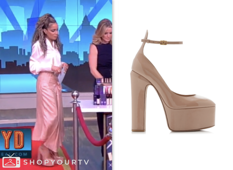 The View: November 2022 Sunny Hostin's Gold Yellow Satin Midi Skirt ...